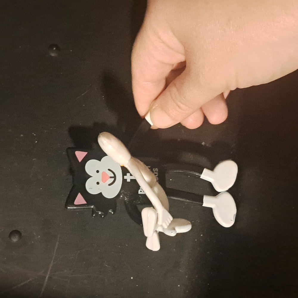 A black cat and his Boo bendy posable